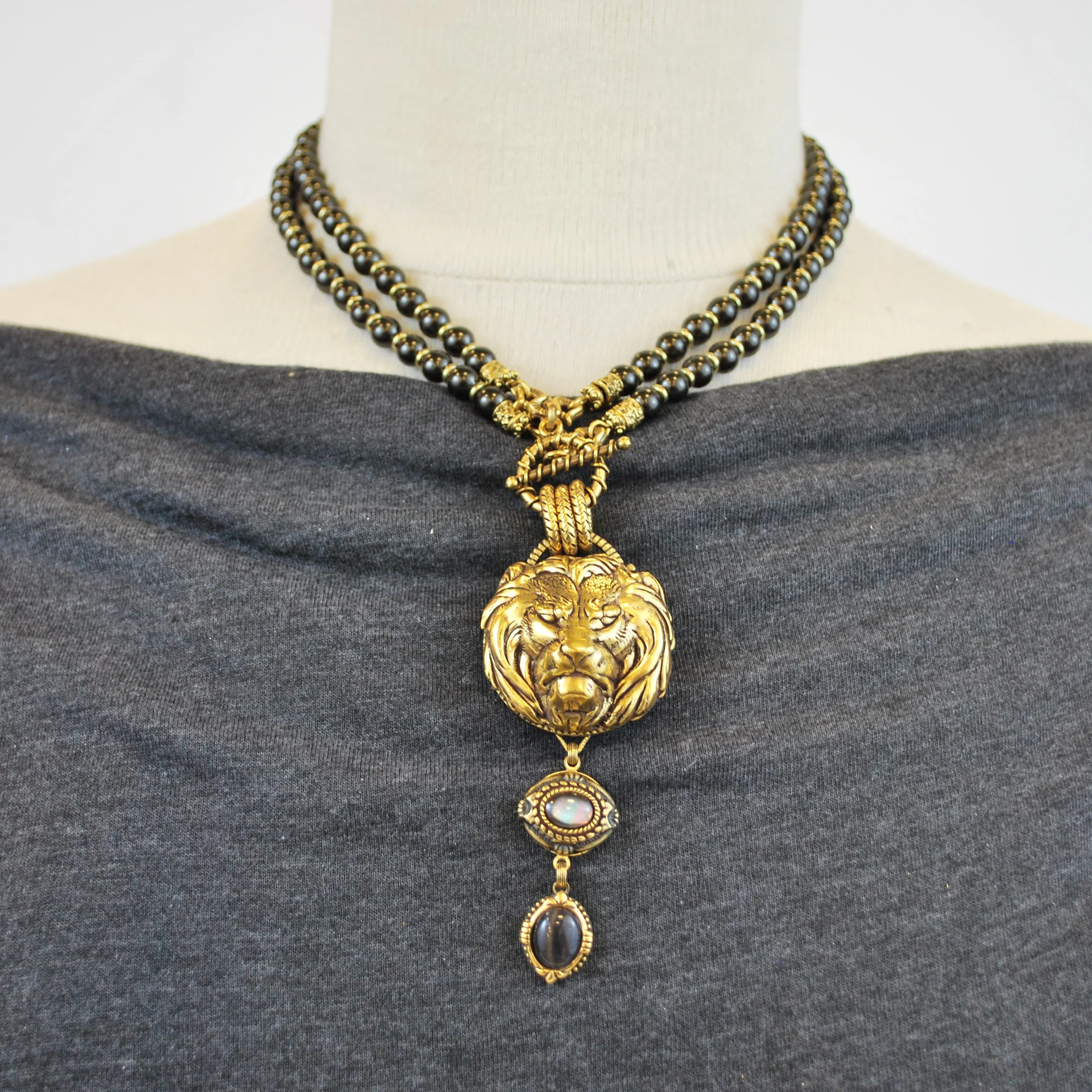 Gold Lion Head Necklace with Charcoal Drop - Image 4