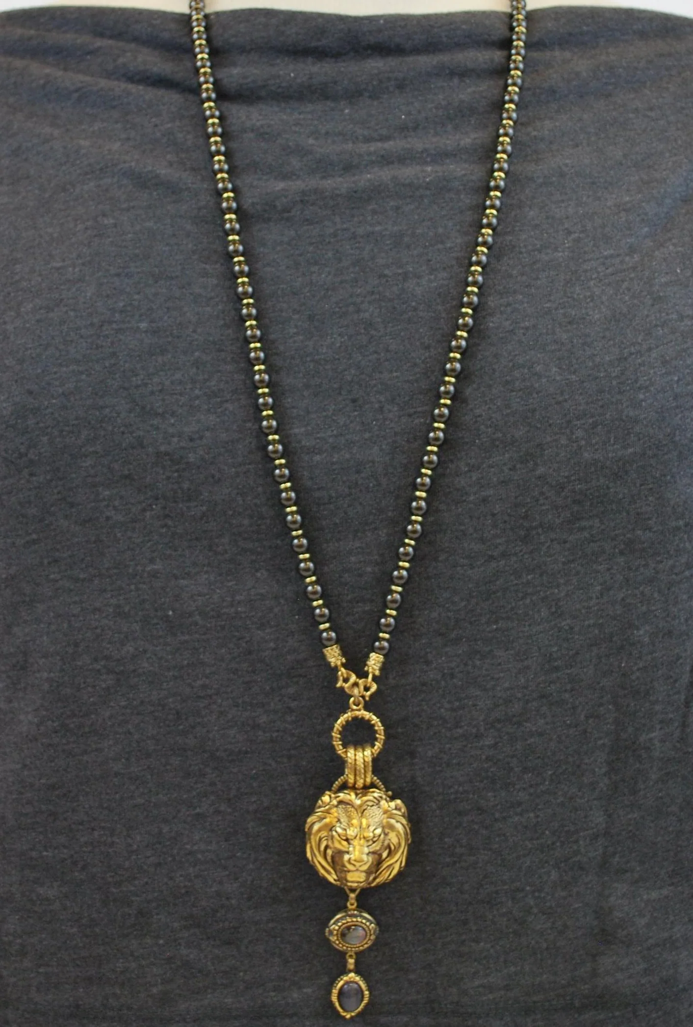 Gold Lion Head Necklace with Charcoal Drop - Image 5